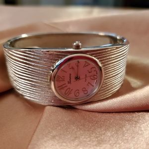 Ladies silver wide band watch